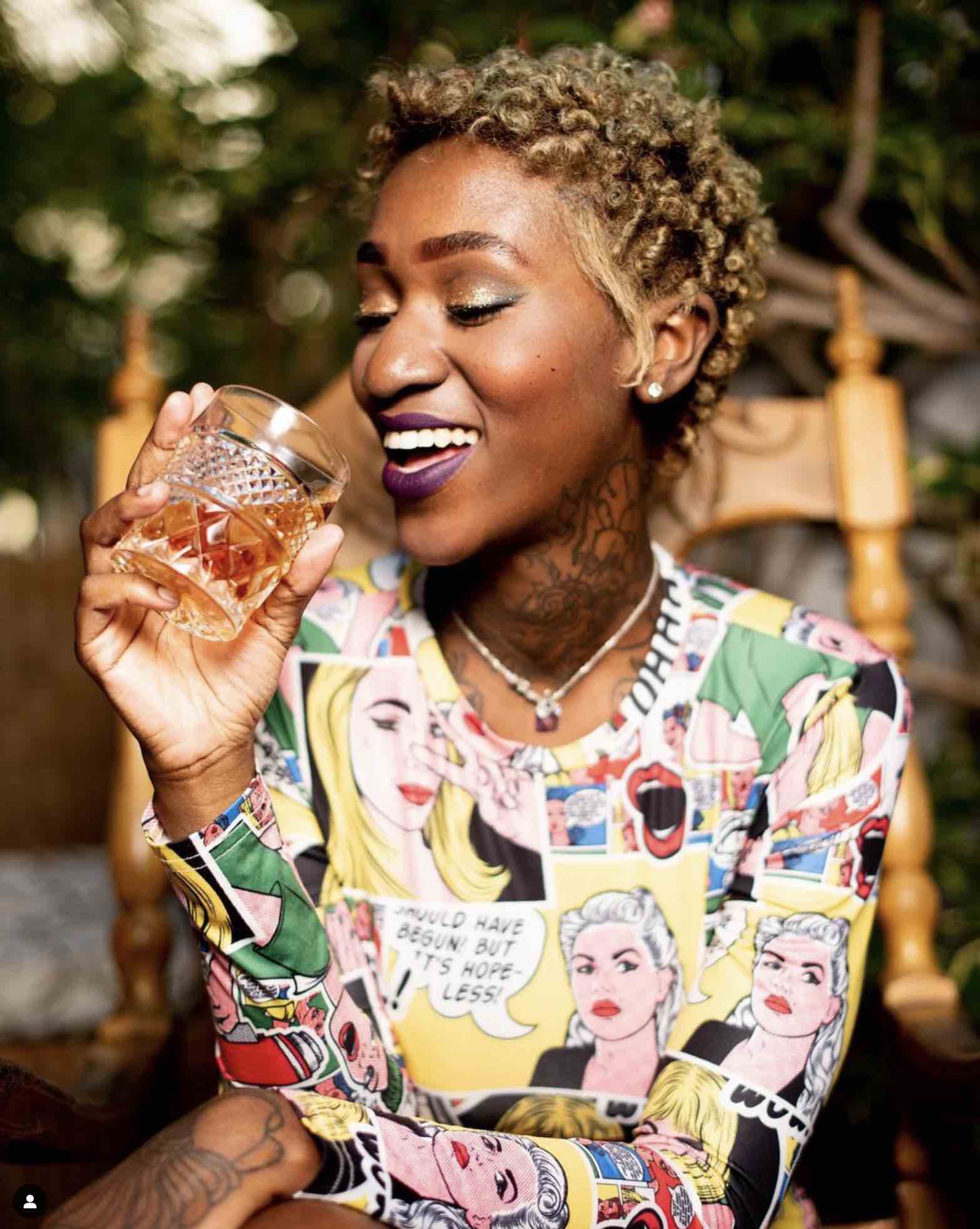 woman-drinking-black-tears-rum woman drinking black tears cuban spiced rum